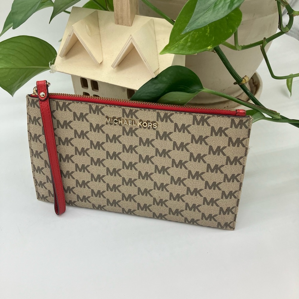 Michael Kors Beige and Red Monogram Clutch perfect size for your passport.